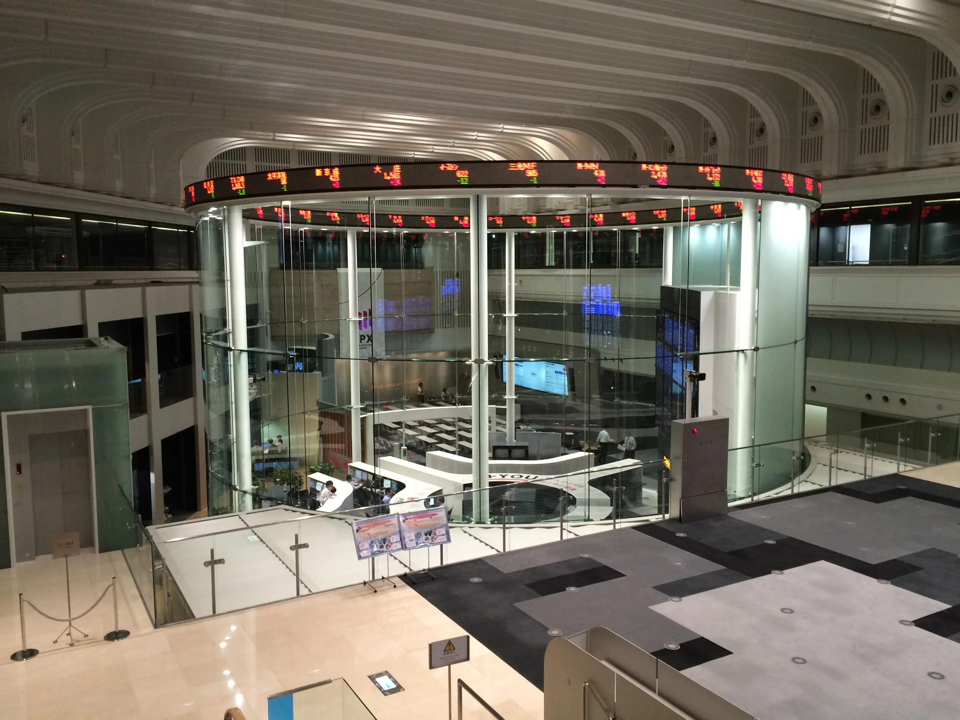 Nikkei 225 slips below 60,000 after brief record high on profit-taking